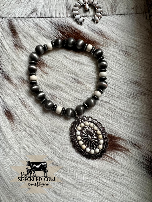 Navajo Pearl and White Concho Bracelet